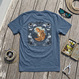 Redfish Nation Short Sleeve Logo T-Shirt - Flat lay with fishing gear